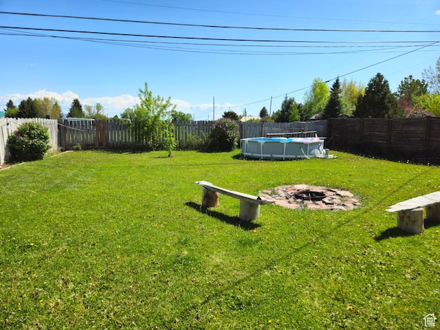 613 Jefferson St, Montpelier, ID 83254 - view of yard with an outdoor fire pit