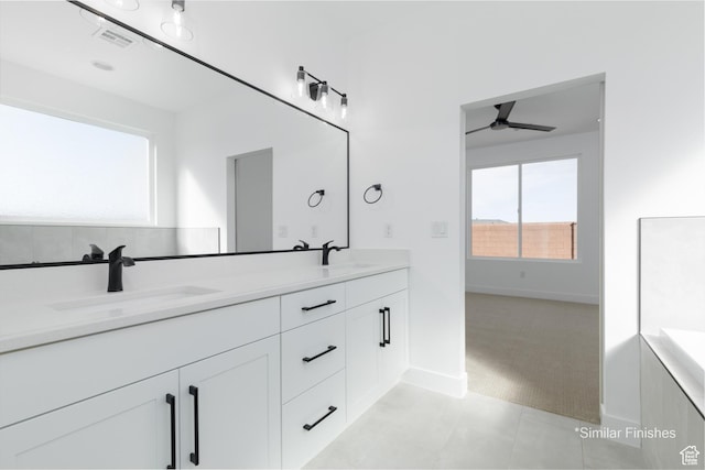 4085 E El Capitan Way, St George, UT 84790 - full bath with double vanity, baseboards, a sink, and a ceiling fan