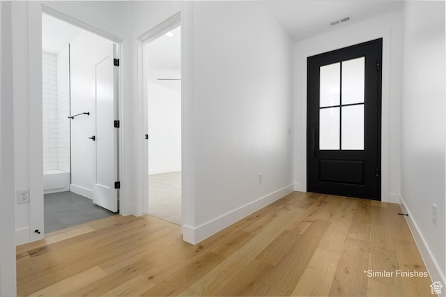 4085 E El Capitan Way, St George, UT 84790 - entrance foyer with visible vents, baseboards, and light wood finished floors