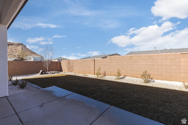 4085 E El Capitan Way, St George, UT 84790 - view of yard with a fenced backyard and a patio