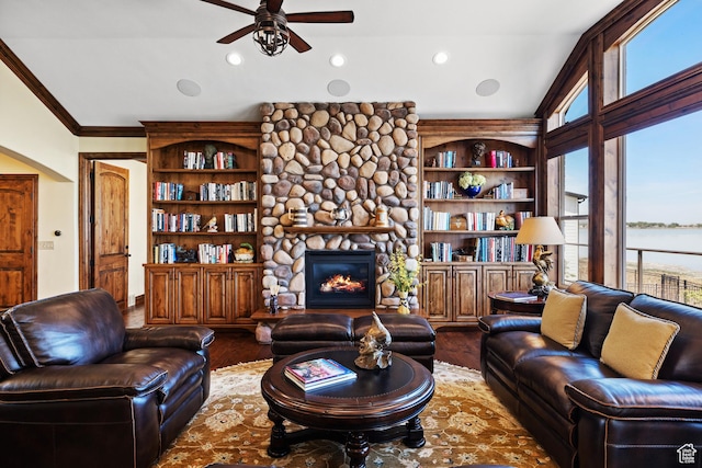 1698 S Amanda Ln E, Saratoga Springs, UT 84045 - living room featuring ornamental molding, a ceiling fan, a fireplace, and wood finished floors