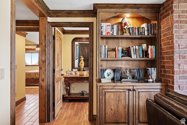 1698 S Amanda Ln E, Saratoga Springs, UT 84045 - interior space featuring brick wall and light wood finished floors