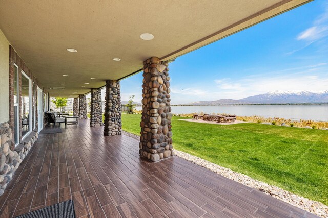 1698 S Amanda Ln E, Saratoga Springs, UT 84045 - view of patio featuring a water and mountain view