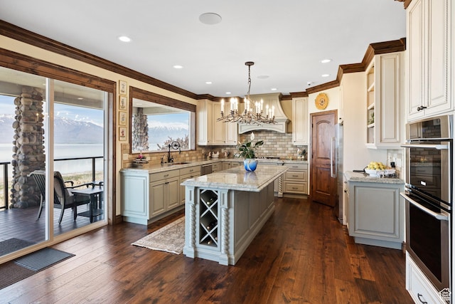 1698 S Amanda Ln E, Saratoga Springs, UT 84045 - kitchen with a sink, appliances with stainless steel finishes, custom exhaust hood, a center island, and dark wood-style floors