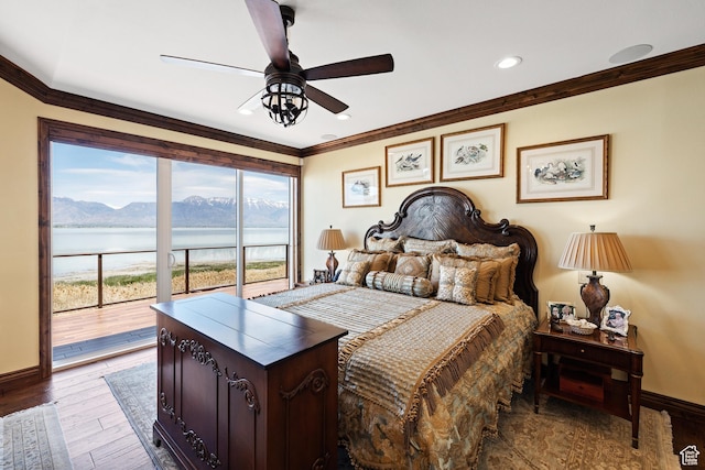 1698 S Amanda Ln E, Saratoga Springs, UT 84045 - bedroom with baseboards, ornamental molding, wood finished floors, access to exterior, and a water and mountain view