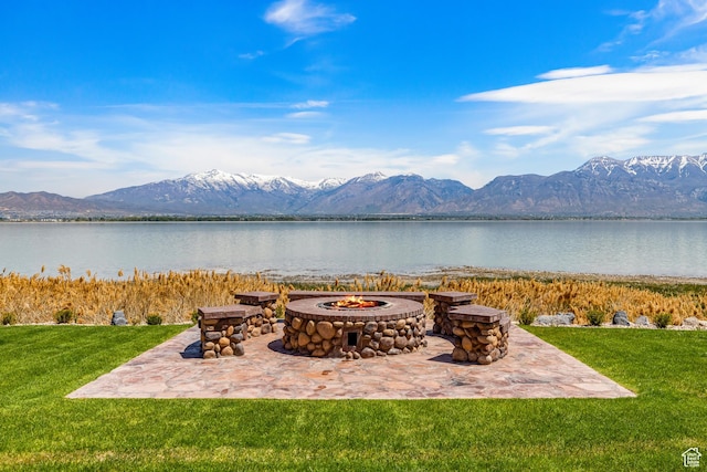 1698 S Amanda Ln E, Saratoga Springs, UT 84045 - view of patio / terrace featuring a fire pit and a water and mountain view