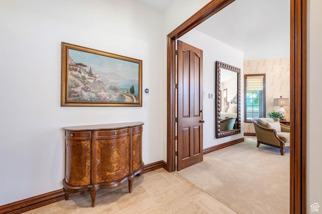290 E 200 S, Parowan, UT 84761 - hallway featuring light carpet, wallpapered walls, and baseboards