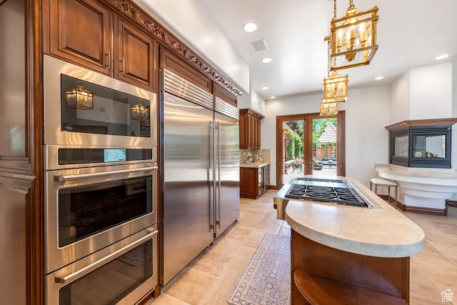 290 E 200 S, Parowan, UT 84761 - kitchen featuring recessed lighting, light countertops, visible vents, appliances with stainless steel finishes, and a kitchen island