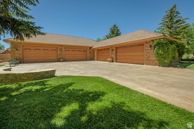 290 E 200 S, Parowan, UT 84761 - view of front of home with a garage, driveway, and a front yard