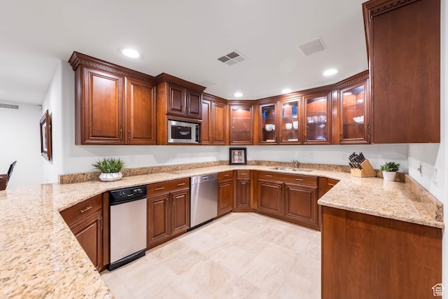 290 E 200 S, Parowan, UT 84761 - kitchen featuring appliances with stainless steel finishes, recessed lighting, visible vents, and light stone countertops