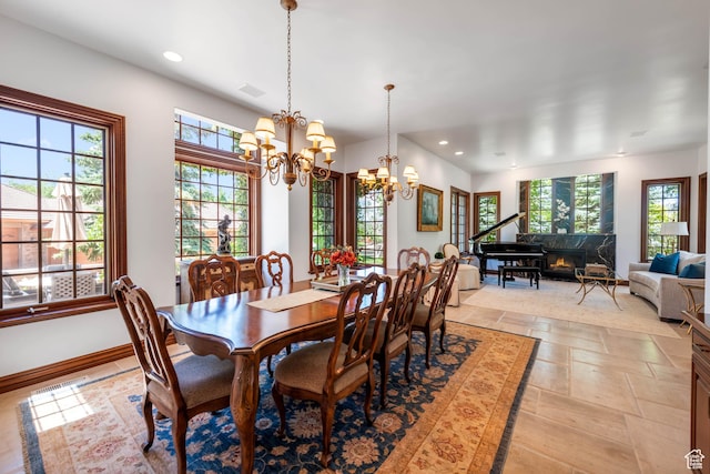 290 E 200 S, Parowan, UT 84761 - dining area featuring recessed lighting, stone tile floors, a fireplace, and baseboards