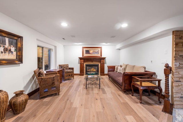 290 E 200 S, Parowan, UT 84761 - living area featuring baseboards, recessed lighting, a glass covered fireplace, and light wood-style floors
