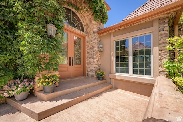 290 E 200 S, Parowan, UT 84761 - view of exterior entry featuring stucco siding, stone siding, and french doors