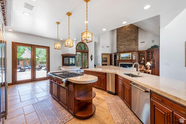 290 E 200 S, Parowan, UT 84761 - kitchen with stainless steel appliances, light countertops, a fireplace, open shelves, and a sink