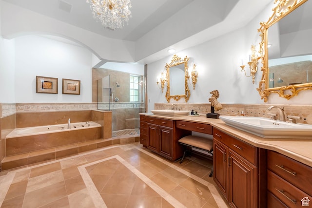 290 E 200 S, Parowan, UT 84761 - bathroom featuring double vanity, a sink, a shower stall, a chandelier, and a bath
