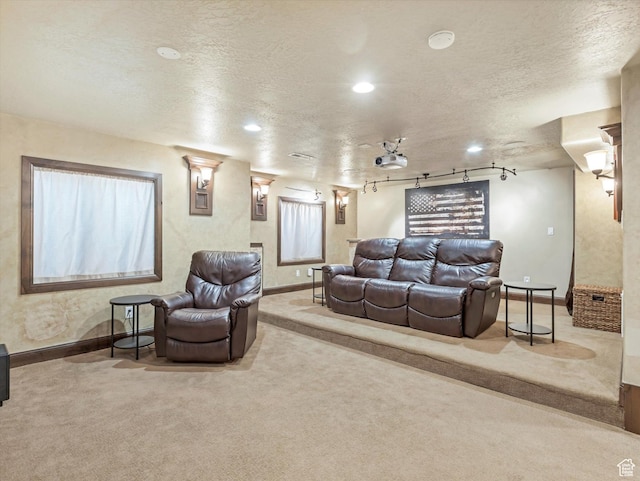 5204 N Eagles View Dr N, Lehi, UT 84043 - carpeted home theater with baseboards, a textured ceiling, recessed lighting, and rail lighting