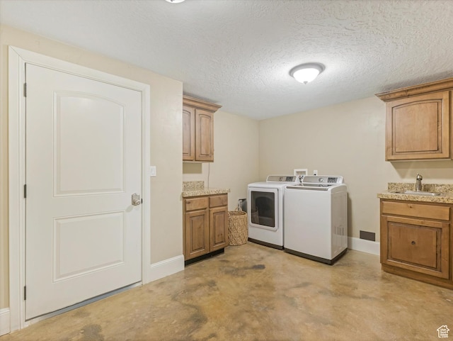 5204 N Eagles View Dr N, Lehi, UT 84043 - washroom featuring washer and dryer, cabinet space, baseboards, and a textured ceiling
