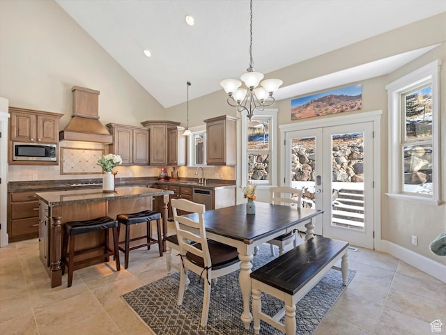5204 N Eagles View Dr N, Lehi, UT 84043 - dining room with a chandelier, french doors, high vaulted ceiling, baseboards, and recessed lighting