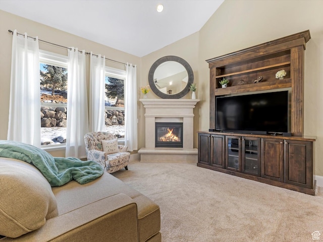 5204 N Eagles View Dr N, Lehi, UT 84043 - living room with carpet floors, a glass covered fireplace, and lofted ceiling