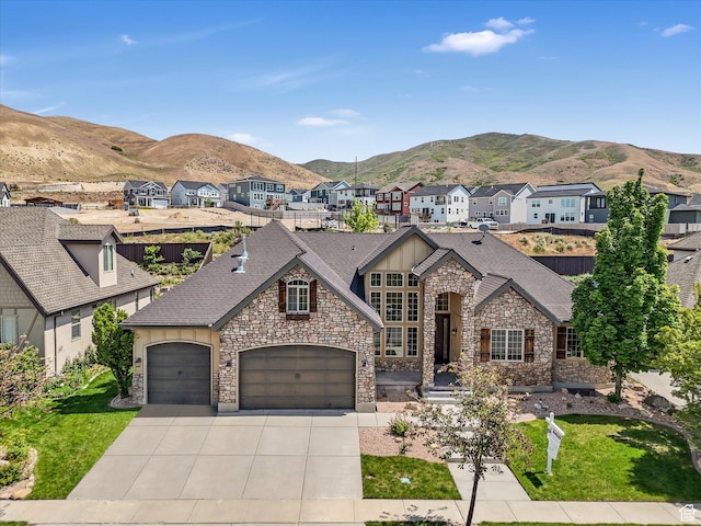 5204 N Eagles View Dr N, Lehi, UT 84043 - view of front of home featuring stone siding, a mountain view, a garage, a residential view, and driveway