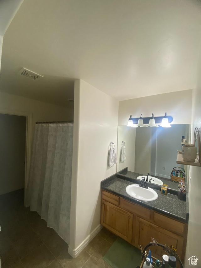 10611 S Oquirrh Lake Rd W, South Jordan, UT 84009 - bathroom with vanity, tile patterned flooring, a shower with shower curtain, and visible vents