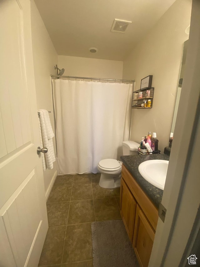 10611 S Oquirrh Lake Rd W, South Jordan, UT 84009 - full bathroom featuring curtained shower, visible vents, tile patterned flooring, and vanity