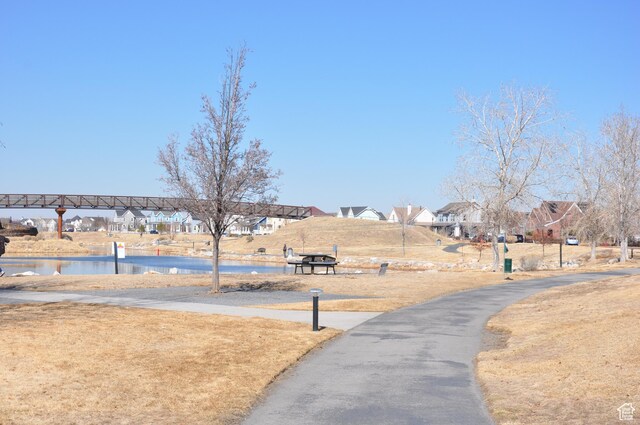 10611 S Oquirrh Lake Rd W, South Jordan, UT 84009 - exterior space with a residential view and a water view