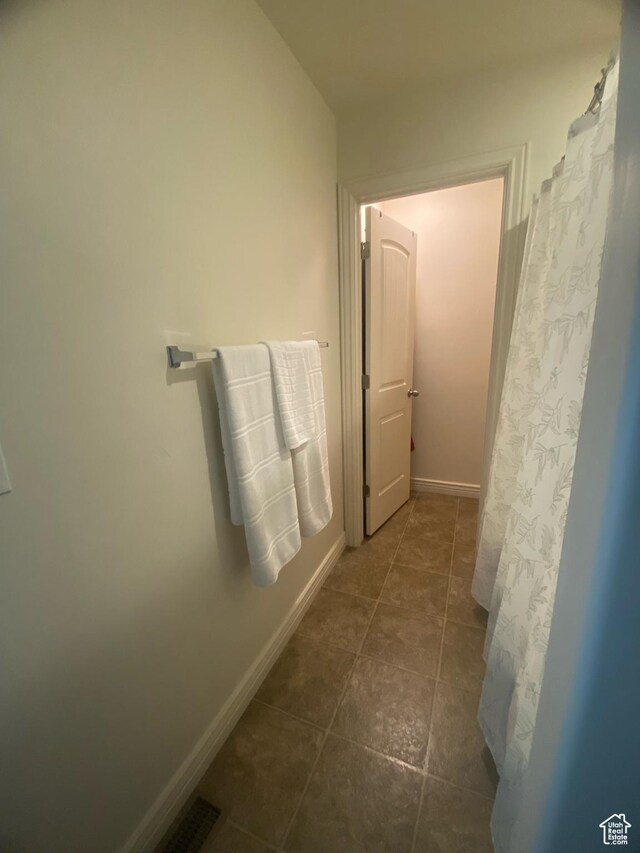 10611 S Oquirrh Lake Rd W, South Jordan, UT 84009 - bathroom featuring baseboards