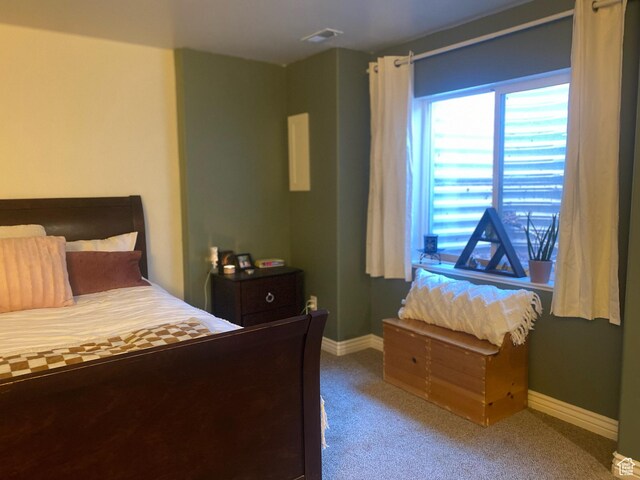 10611 S Oquirrh Lake Rd W, South Jordan, UT 84009 - bedroom with baseboards, visible vents, and carpet floors