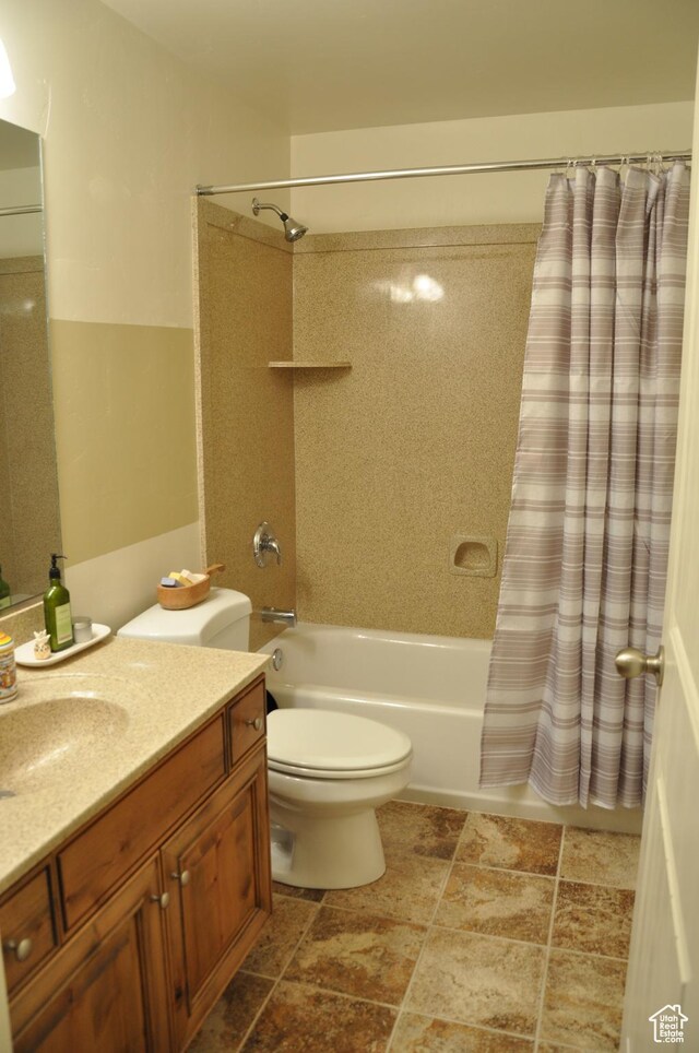 10611 S Oquirrh Lake Rd W, South Jordan, UT 84009 - bathroom featuring shower / tub combo, toilet, and vanity