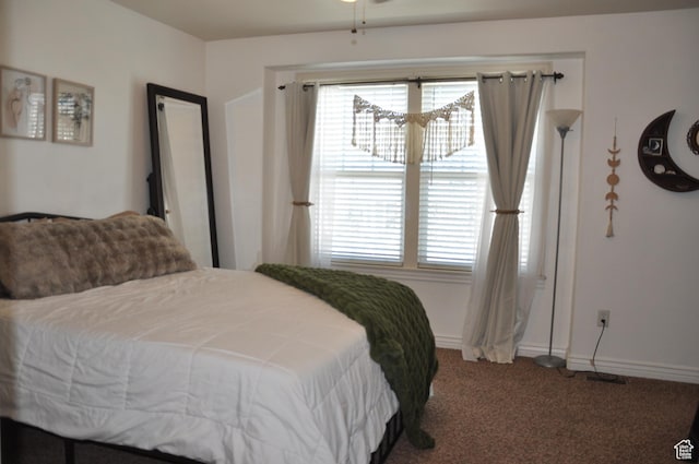 10611 S Oquirrh Lake Rd W, South Jordan, UT 84009 - carpeted bedroom featuring baseboards and multiple windows