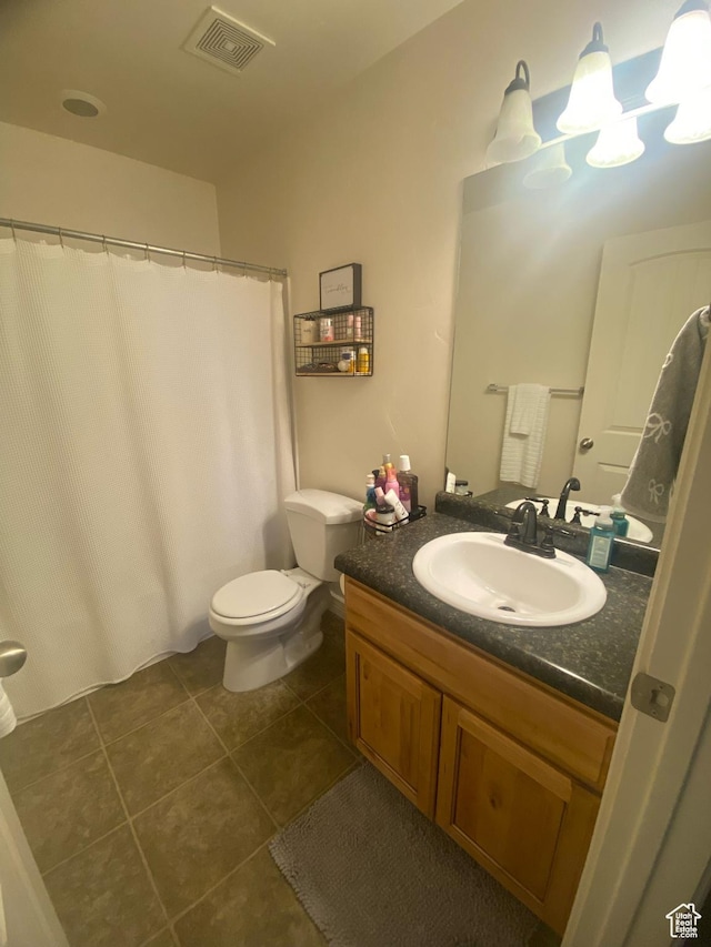 10611 S Oquirrh Lake Rd W, South Jordan, UT 84009 - full bath with tile patterned floors, toilet, visible vents, a notable chandelier, and vanity