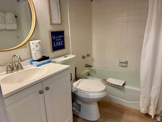 2176 S Bear Blvd Unit 316, & Garden City, UT 84028 - bathroom with toilet, shower / bathtub combination with curtain, wood finished floors, and vanity