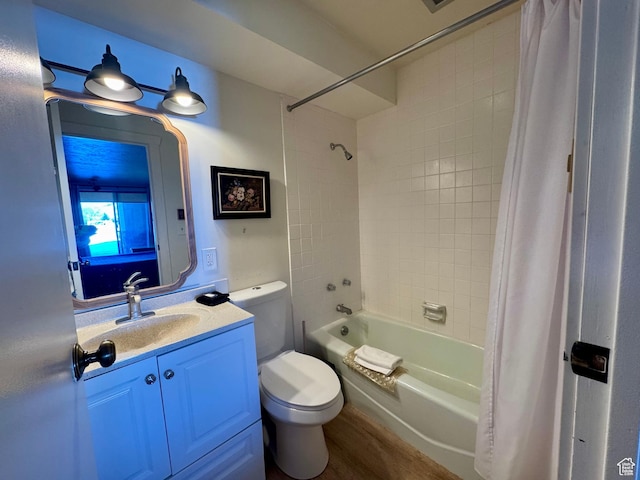2176 S Bear Blvd Unit 316, & Garden City, UT 84028 - full bath with toilet, vanity, shower / bath combination with curtain, and wood finished floors