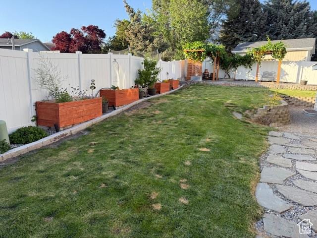 10063 N Poplar Ct, Cedar Hills, UT 84062 - fenced backyard with a garden