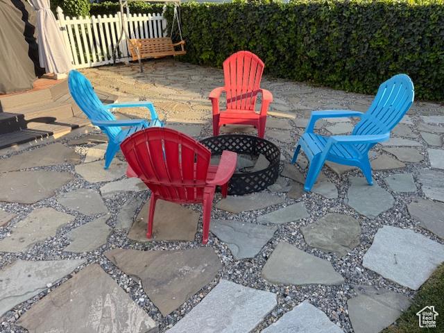 10063 N Poplar Ct, Cedar Hills, UT 84062 - view of patio featuring an outdoor fire pit