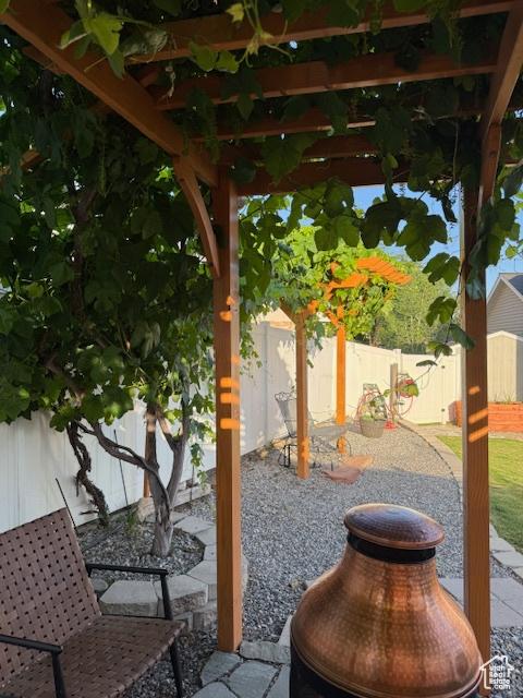 10063 N Poplar Ct, Cedar Hills, UT 84062 - fenced backyard with a patio