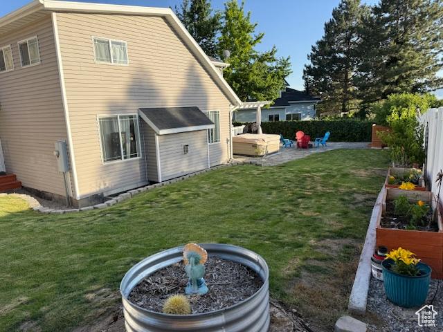 10063 N Poplar Ct, Cedar Hills, UT 84062 - back of house with a garden and a patio