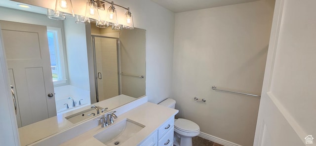 3392 E Stillwater, Eagle Mountain, UT 84005 - bathroom featuring toilet, baseboards, a shower stall, and vanity