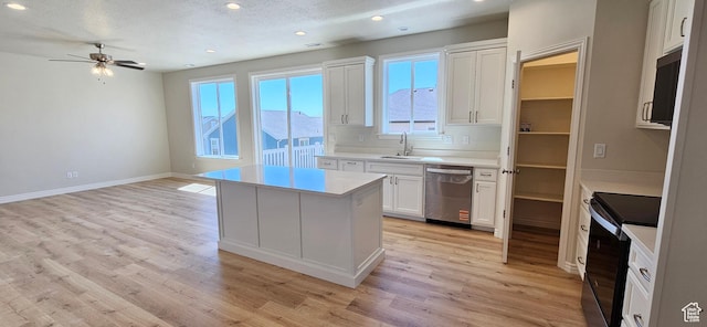 3392 E Stillwater, Eagle Mountain, UT 84005 - kitchen featuring stainless steel dishwasher, a ceiling fan, a sink, recessed lighting, and electric stove