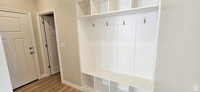 3392 E Stillwater, Eagle Mountain, UT 84005 - mudroom featuring baseboards and wood finished floors