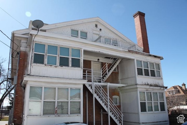 653 E 300 S, Salt Lake City, UT 84102 - view of front of home with stairs and a chimney