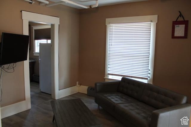 653 E 300 S, Salt Lake City, UT 84102 - living room featuring baseboards