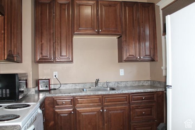 653 E 300 S, Salt Lake City, UT 84102 - kitchen with white appliances, light countertops, and a sink