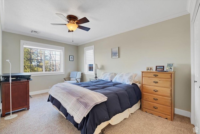 243 Eastridge E, Logan, UT 84321 - bedroom featuring ornamental molding, visible vents, and light carpet