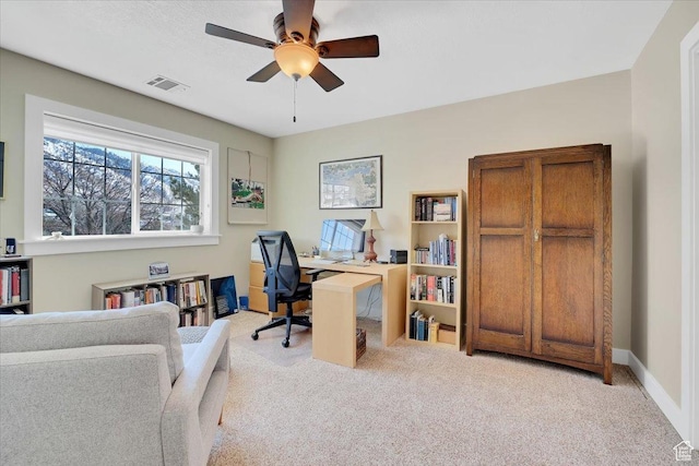 243 Eastridge E, Logan, UT 84321 - office featuring baseboards, a ceiling fan, visible vents, and light colored carpet