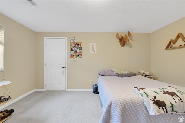 243 Eastridge E, Logan, UT 84321 - carpeted bedroom featuring baseboards and visible vents