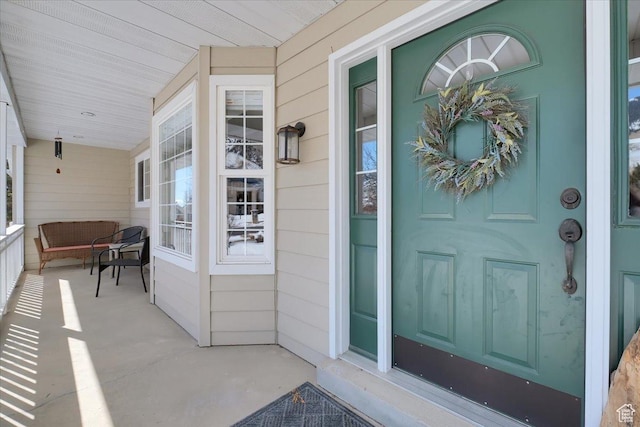 243 Eastridge E, Logan, UT 84321 - view of exterior entry featuring covered porch