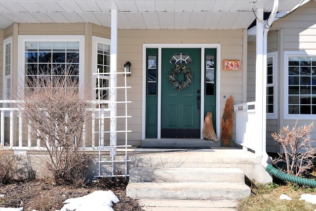 243 Eastridge E, Logan, UT 84321 - doorway to property with a porch
