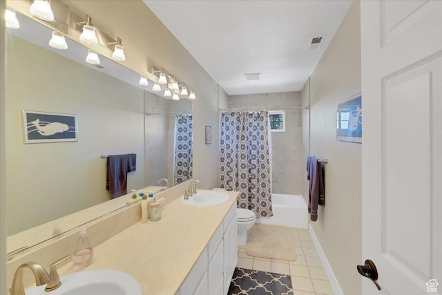243 Eastridge E, Logan, UT 84321 - bathroom with toilet, tile patterned flooring, a sink, and visible vents